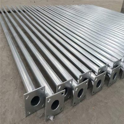 Galvanised octagonal poles stacked with base plates